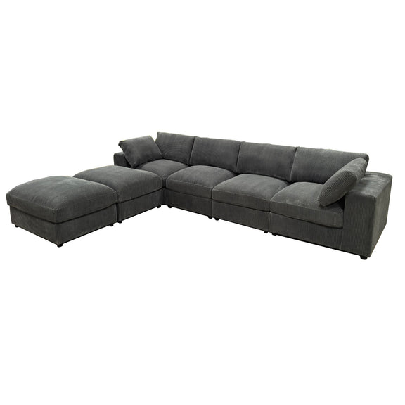 Dark gray L-shaped sectional sofa with chaise and cushioned ottoman seats