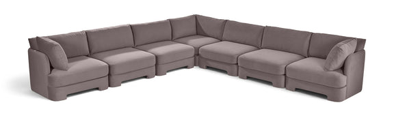Light gray velvet corner sectional sofa with side chaise and 7-piece setup