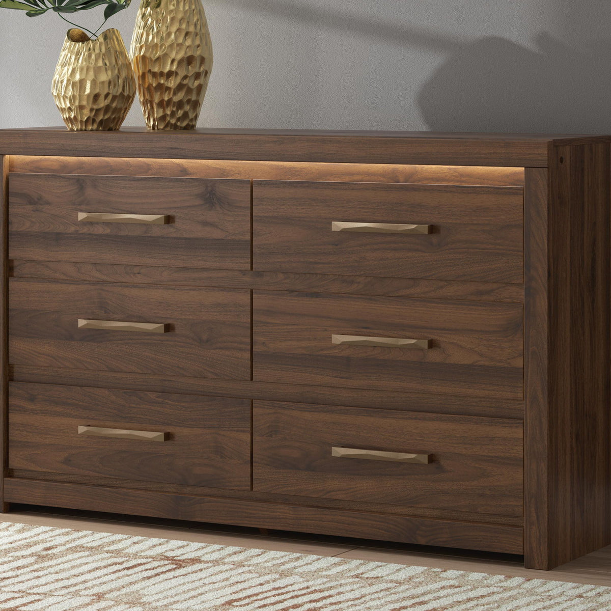 Light brown wood six-drawer dresser with six drawers and horizontal bar pulls