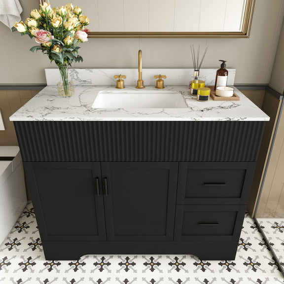 Black bathroom vanity with fluted cabinet, marble-style countertop, center sink, 3 faucet holes