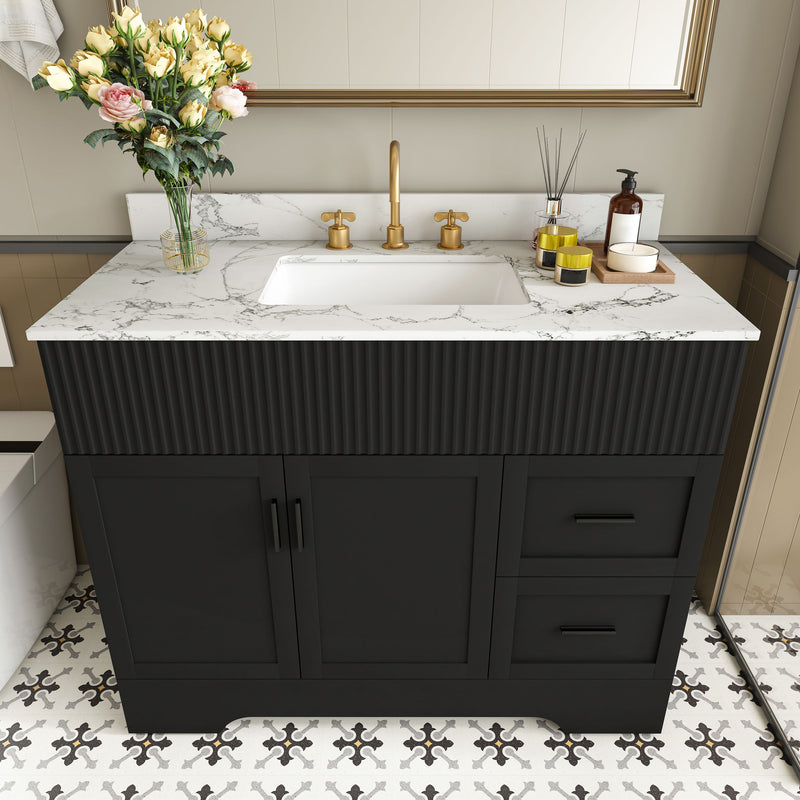 Black bathroom vanity with fluted cabinet, marble-style countertop, center sink, 3 faucet holes