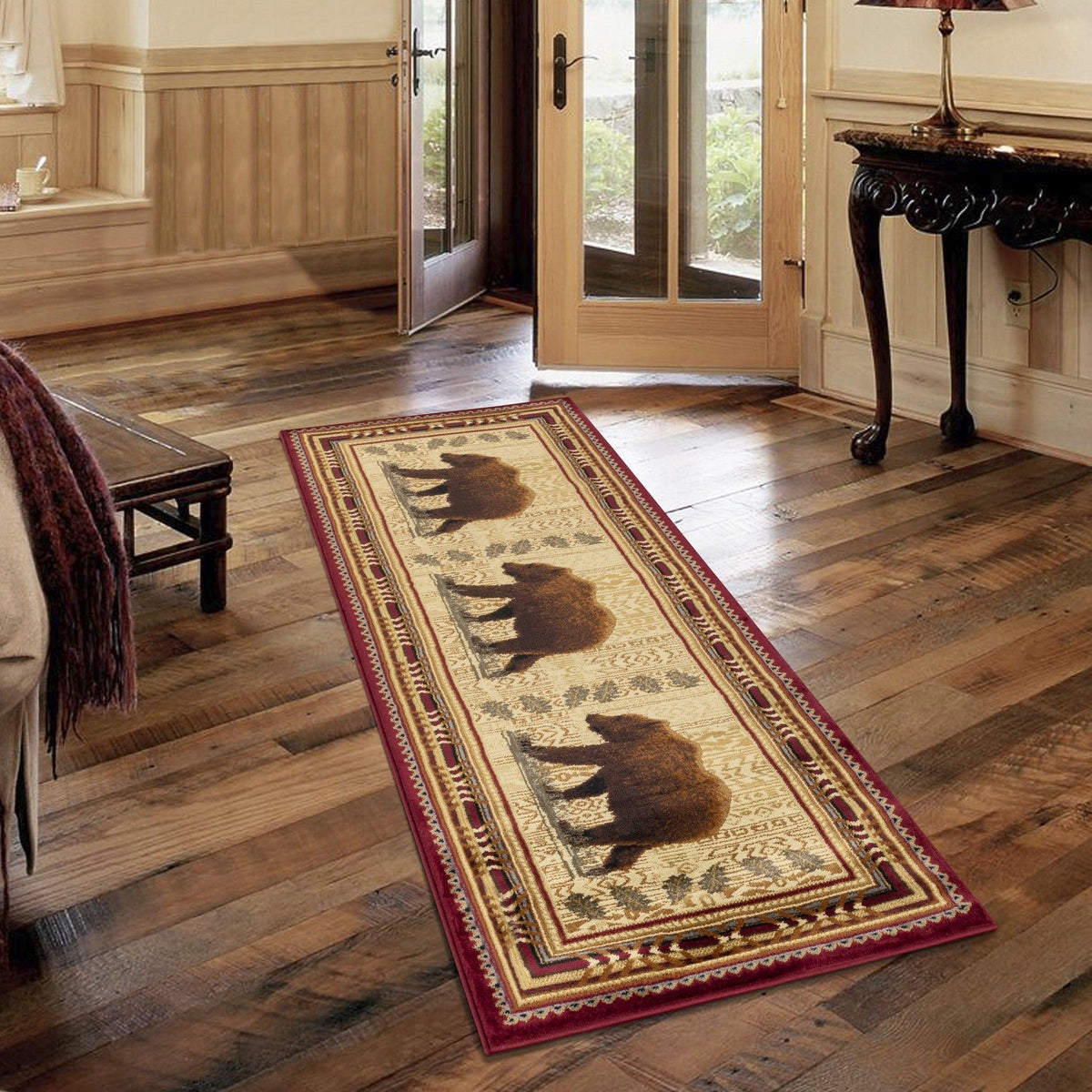 Lodge area rug runner style with beige bear medallion and red border