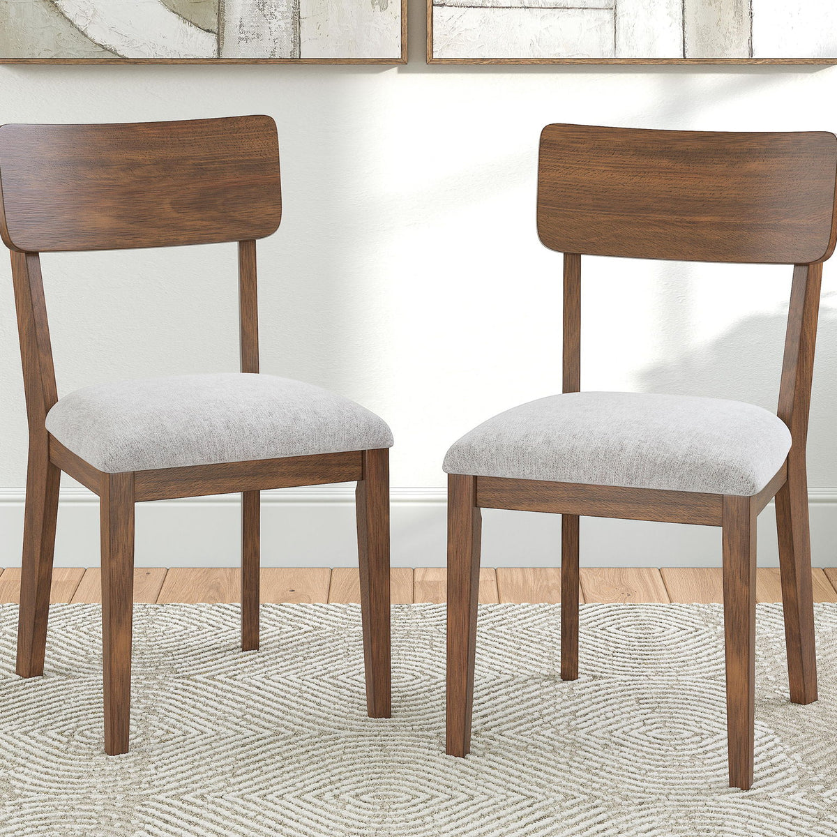 Set of two brown dining side chairs with arched backs and light gray upholstered seats
