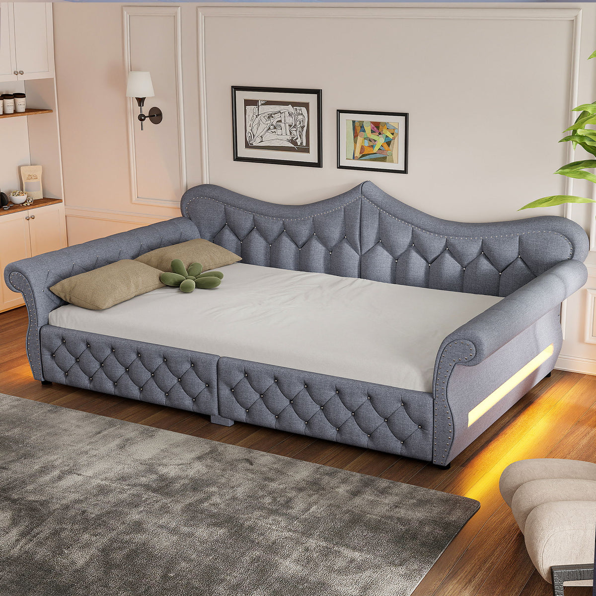 Gray upholstered daybed with tufted back and side LED strip, nailhead trim