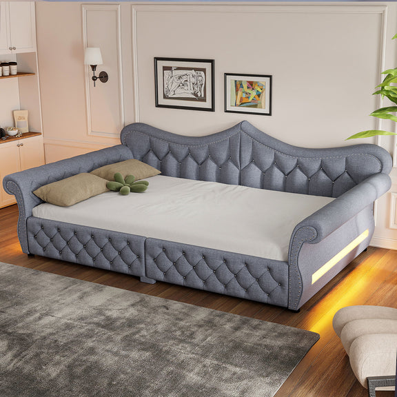 Gray upholstered daybed with tufted back and side LED strip, nailhead trim