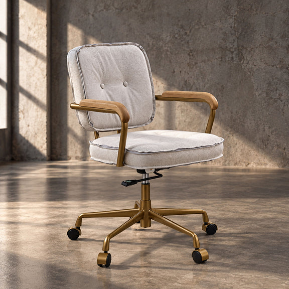 White office chair with tufted back, cushioned seat, padded armrests, and casters.