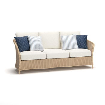 Stewarts Point beige sofa with woven frame, cream seat cushions, and four patterned throw pillows