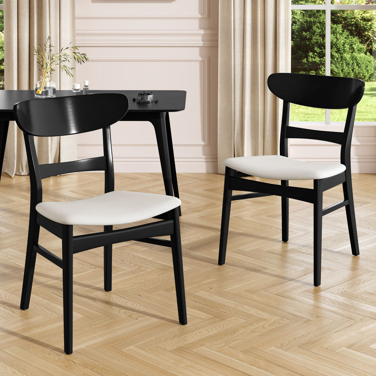 Black dining chairs set of 2 with light cushioned seats and curved black backs