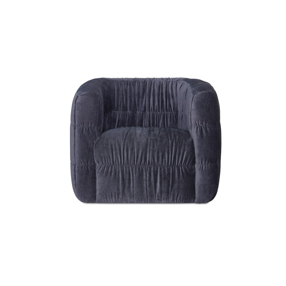 Navy velvet swivel chair with rounded arms and tufted, pleated upholstery