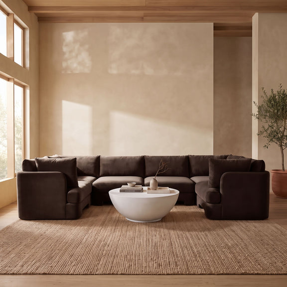 Dark brown velvet U-shaped sectional sofa, 6-piece set with deep upholstered cushions.