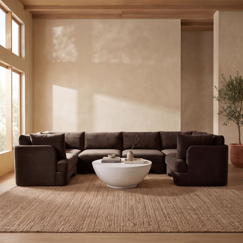 Dark brown velvet U-shaped sectional sofa, 6-piece set with deep upholstered cushions.