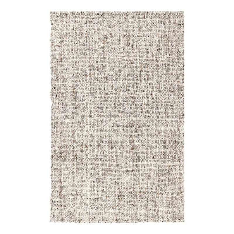 Natural wool rug with all-over speckled texture and compact low pile