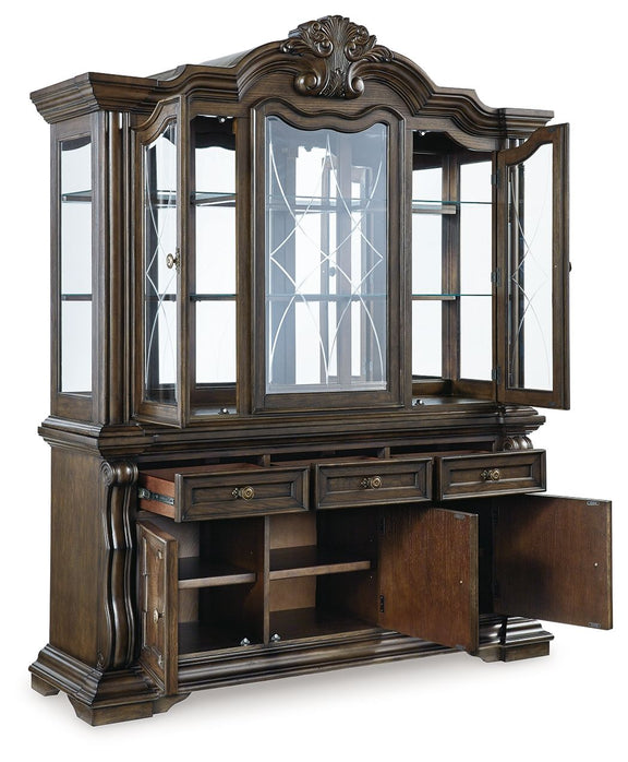 Dark brown buffet hutch with glass hutch doors and open lower storage with shelves