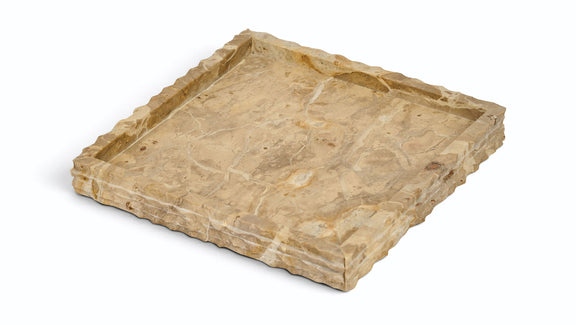 Beige marble tray with natural veining and raised, squared edges.