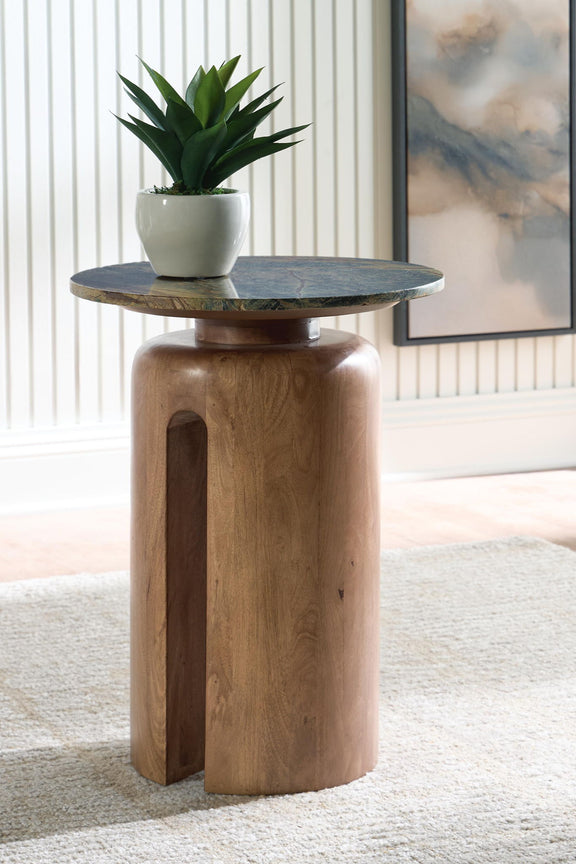 Brown wood accent table with round green patterned top on pedestal base