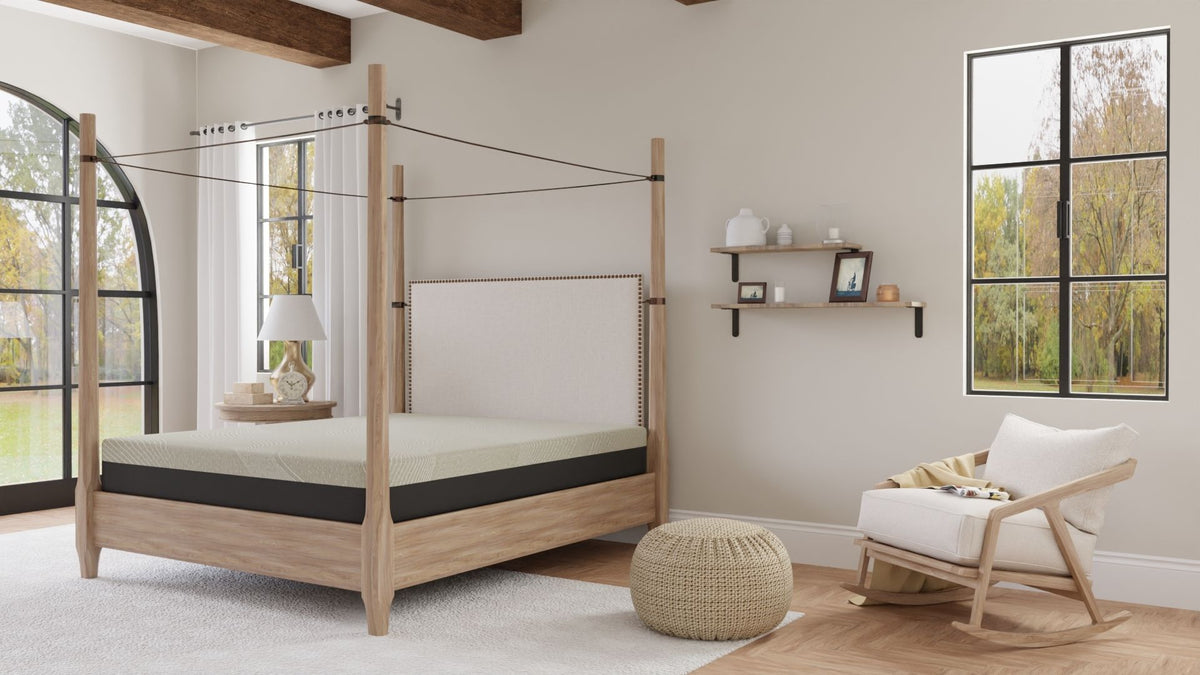 Gray gel memory foam tight-top mattress centered on wood bed frame