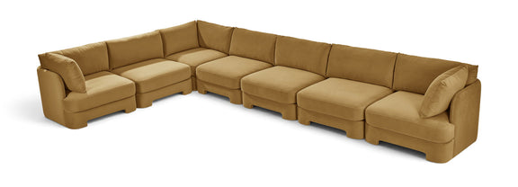 Velvet sectional sofa in tan with square arms and tufted-style cushion panels