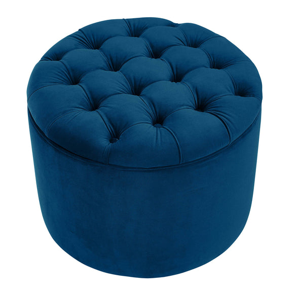 Blue velvet round storage ottoman with tufted top, angled view