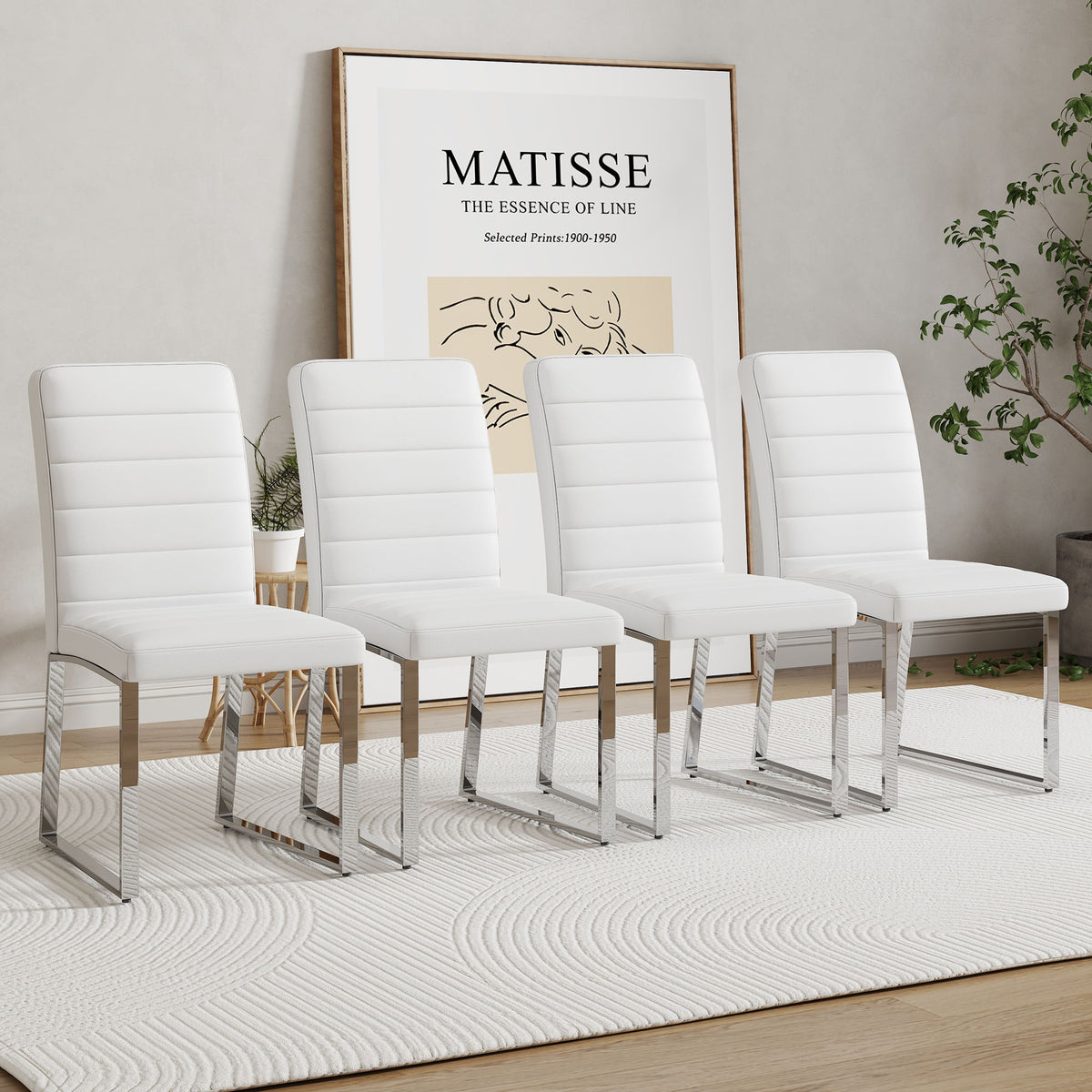 Group of white upholstered dining chairs with curved backs, padded seats, and chrome legs