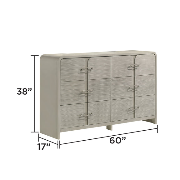 Beige dresser with textured front panels and multiple drawers, side view