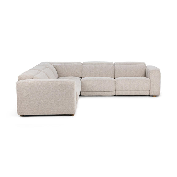Light gray sectional sofa with chaise extension, clean lines and tufted cushions