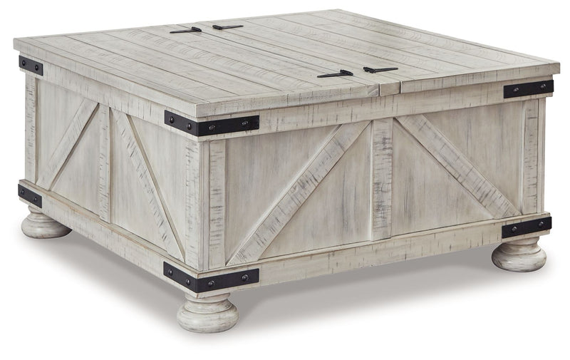 Whitewash cocktail table with storage panels, slatted top, and black latch hardware