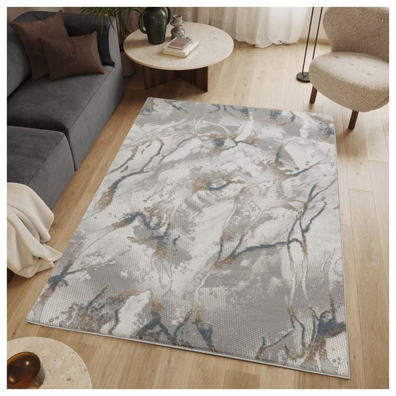 Gray area rug with marbled blue, gold, and white pattern, large rectangular layout