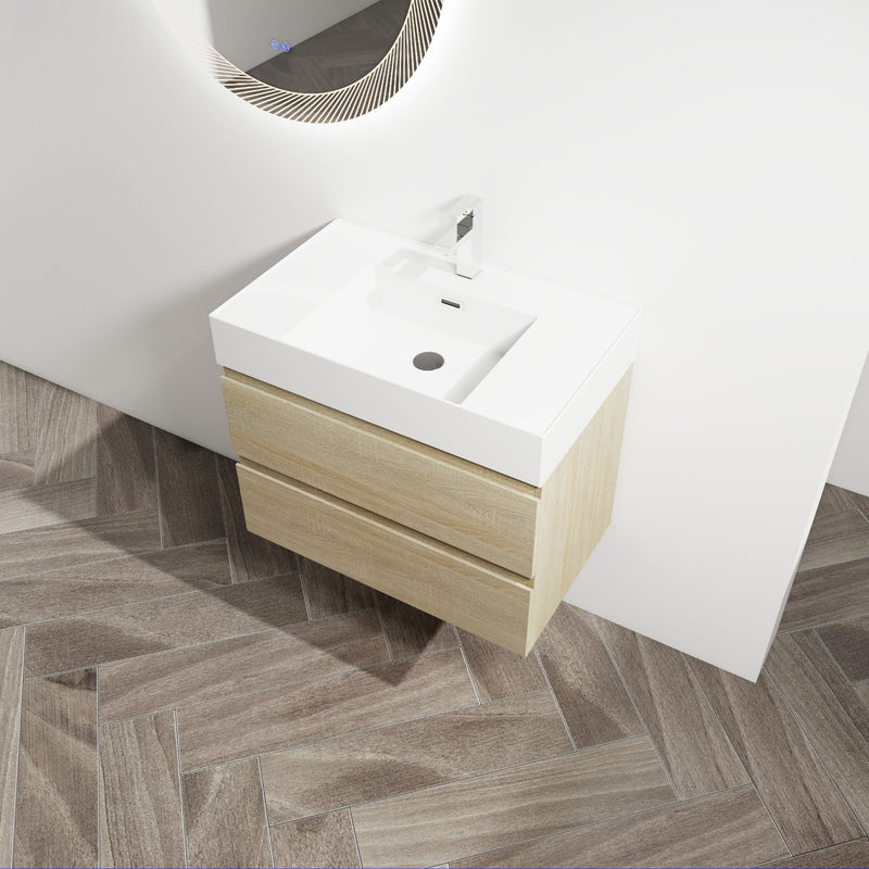 Wall-mounted bathroom vanity with white sink and faucet; light brown cabinet and two drawers