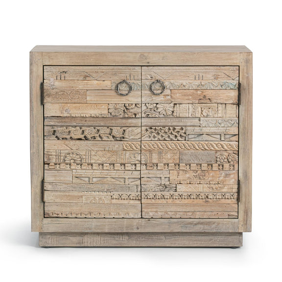 Two-door carved panel sideboard with decorative front doors and two round metal knobs.
