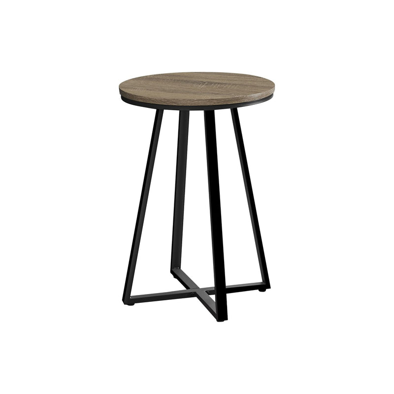 Light brown round accent side table with flat circular top and black tapered legs