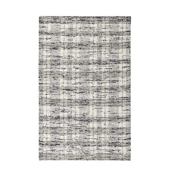 Ivory distressed area rug with blue speckle and subtle grid pattern