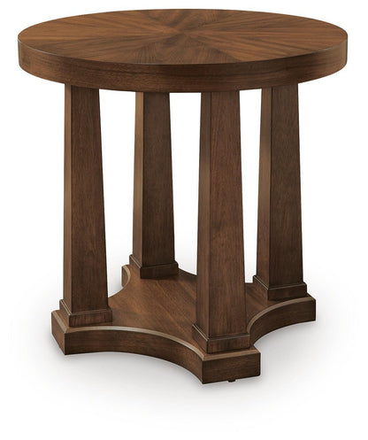 Round wooden end table with curved apron and four pedestal legs