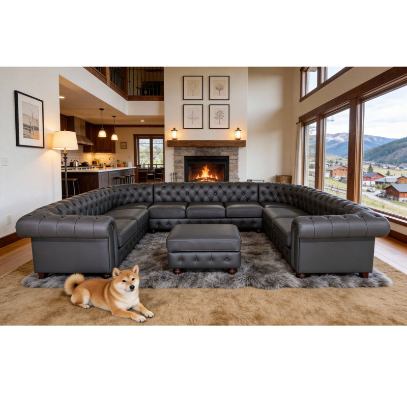 Dark gray tufted U-shape sectional sofa with center ottoman and low square armrests