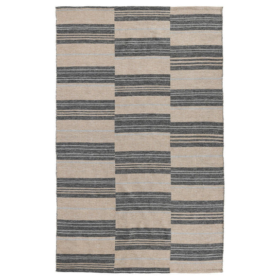 Indoor/outdoor striped patchwork rug with taupe, beige, and dark gray block pattern