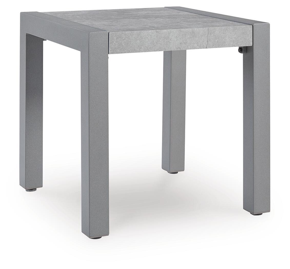 Gray rectangular table with concrete-look top and squared corner legs.