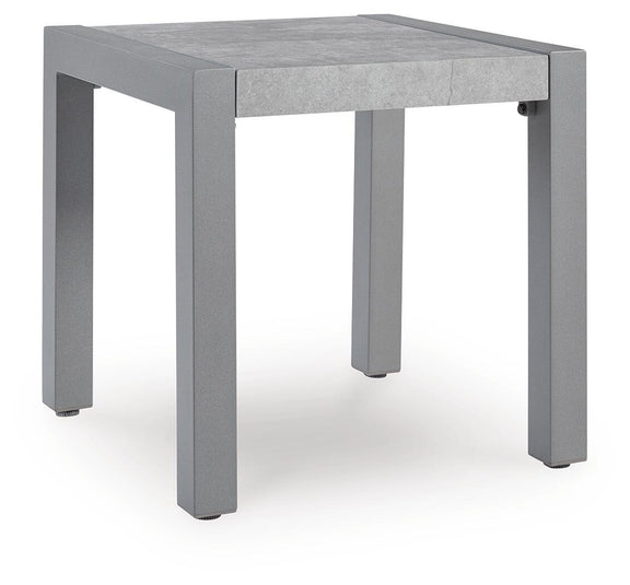 Gray rectangular table with concrete-look top and squared corner legs.