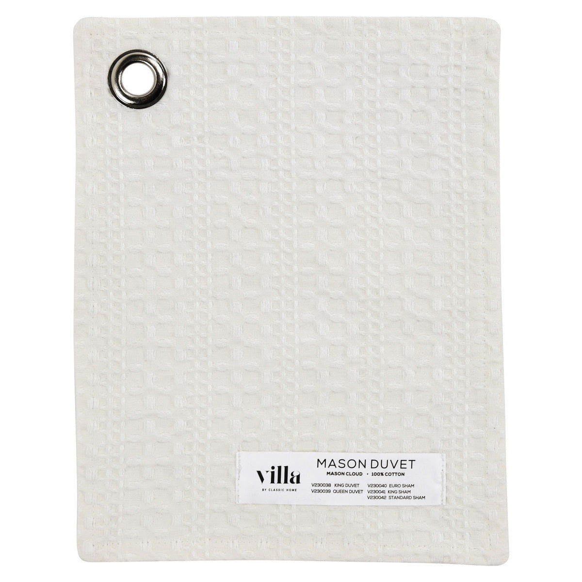 White pillow sham back with circular grommet and fabric brand label