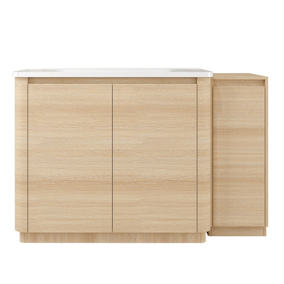 Freestanding bathroom vanity with white sink, light wood finish, and side storage cabinet