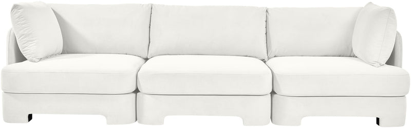 White velvet 3-piece sofa with three seat cushions and rounded armrests