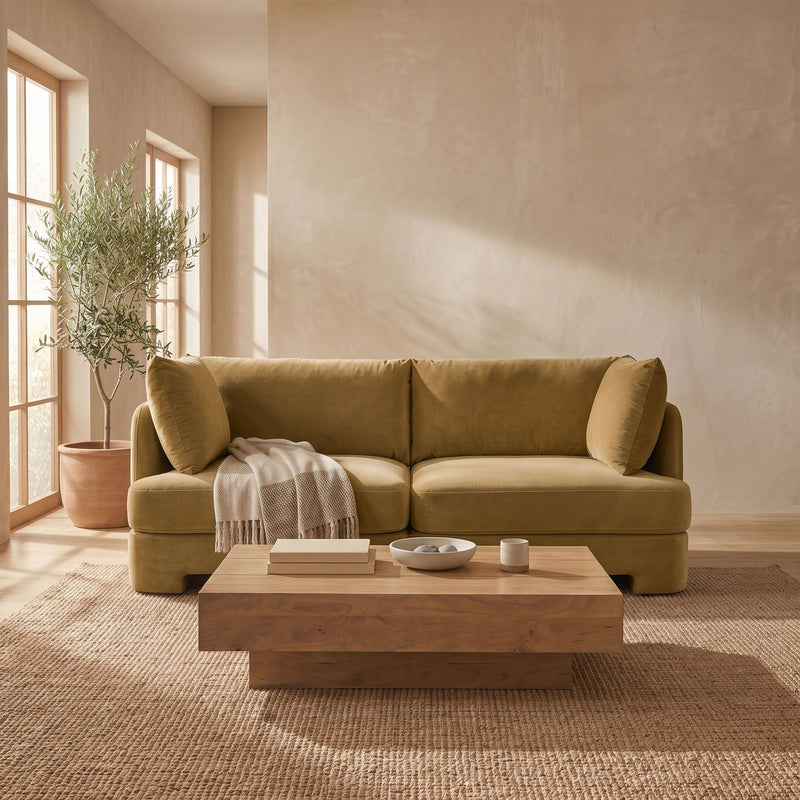 Camel beige velvet upholstered loveseat with rounded arms and back cushions