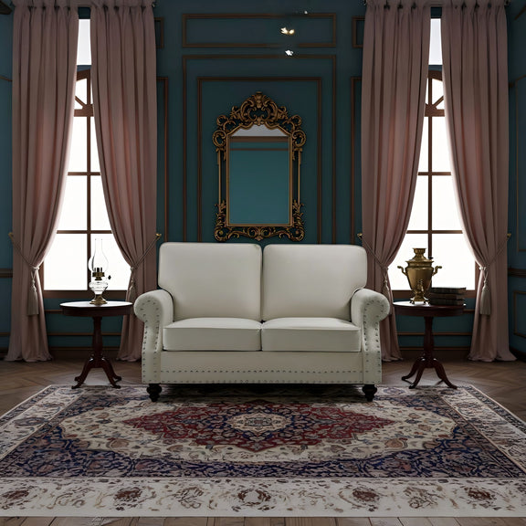 Light beige 2-seat loveseat sofa with nailhead trim, buttoned arms, and turned legs