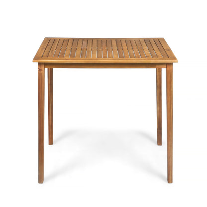 Light brown acacia wood rectangle bar table with slatted top and four straight legs