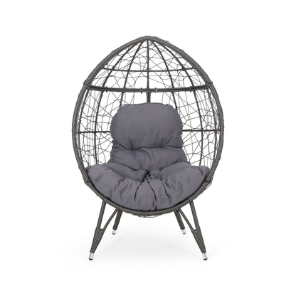 Dark gray round hammered iron teardrop chair with gray padded cushion