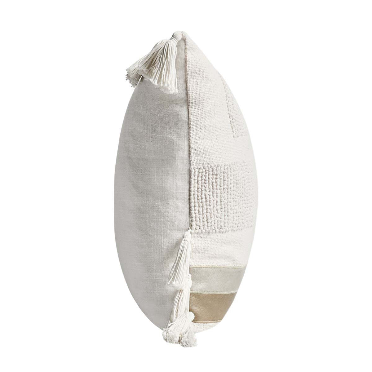 Packer ivory textured pillow with tassels along the edges