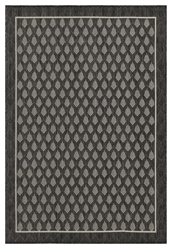 Indoor/outdoor polypropylene area rug, dark gray with white chevron pattern