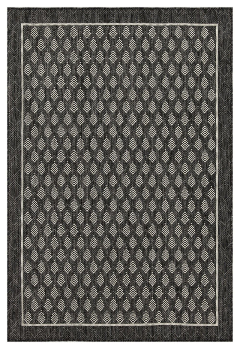 Dark gray area rug with repeating diamond pattern and light accent design