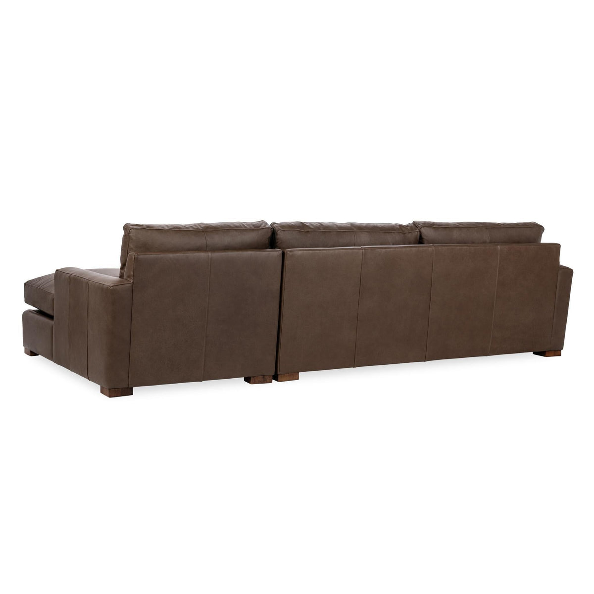 Brown chaise sofa with box cushions and chaise ottoman for extended seating