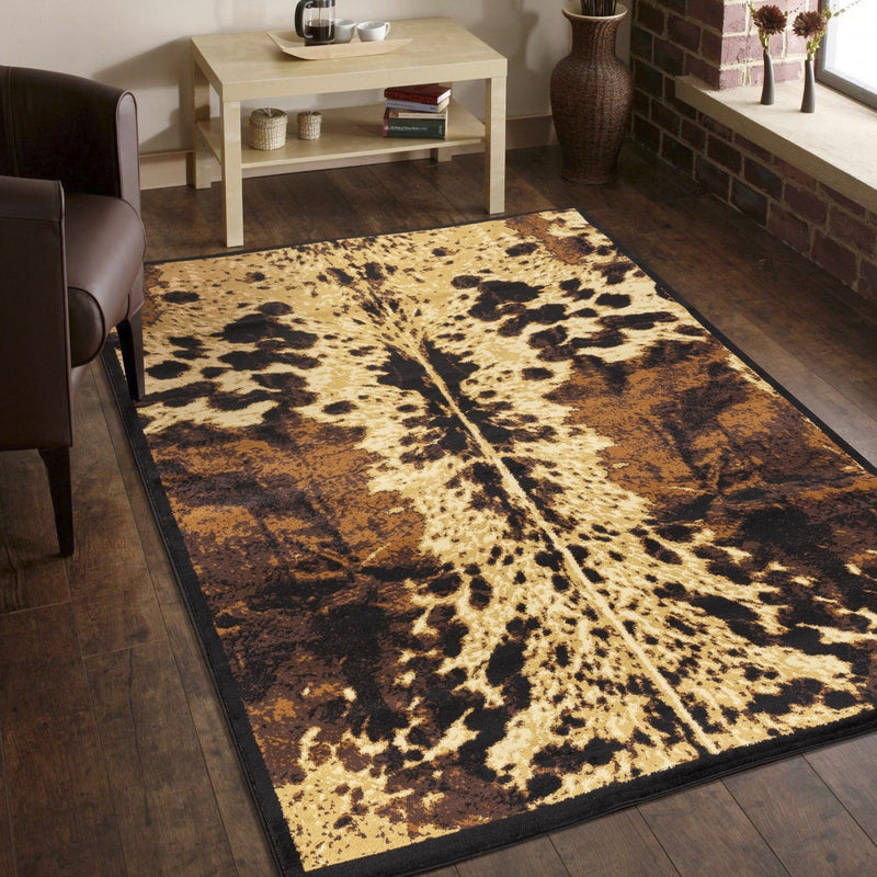 Southwest area rug with bold central axis stripe and leopard blotches in tan and dark brown.