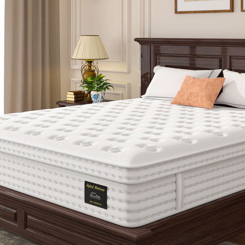 White 12-inch hybrid mattress on wooden bed frame with tufted top and side label