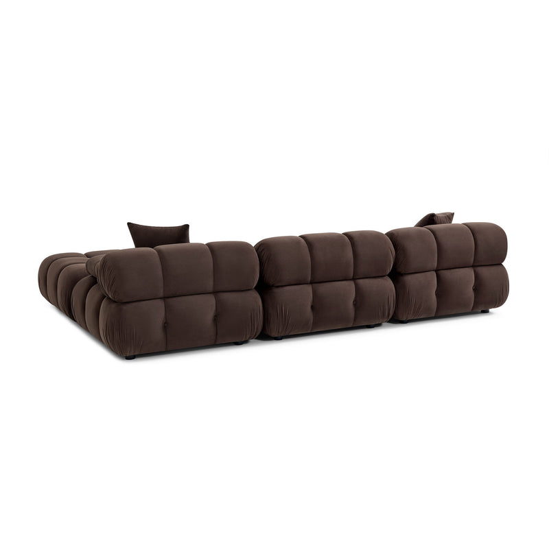 Dark brown modular sectional sofa with tufted seat blocks and back pillows